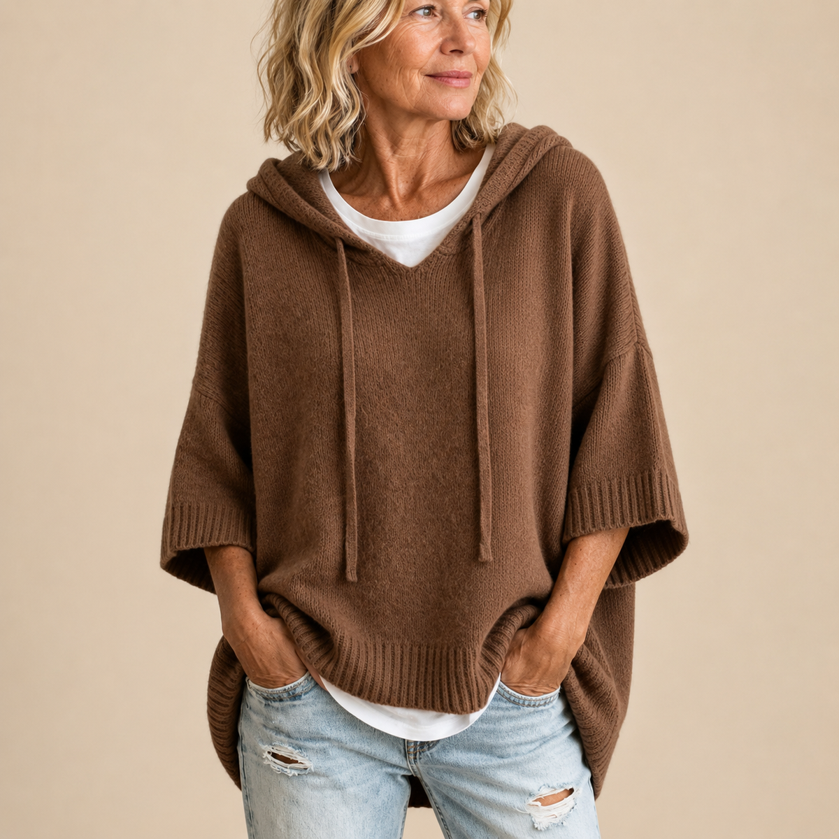Varga | Gebreide poncho met capuchon en driekwart mouwen